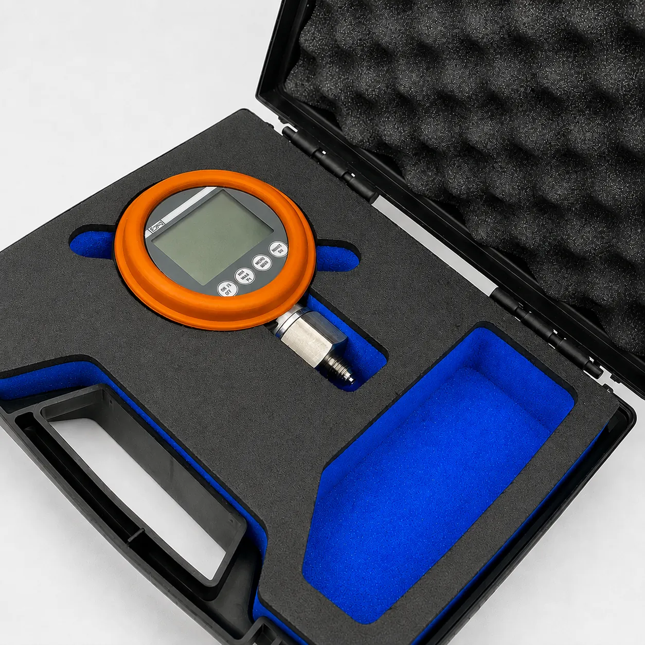DM80 M UMS gauge with orange cap in its foam-inlay case